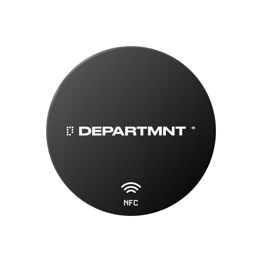 A round sticker in black, carrying the wordmark and the NFC mark