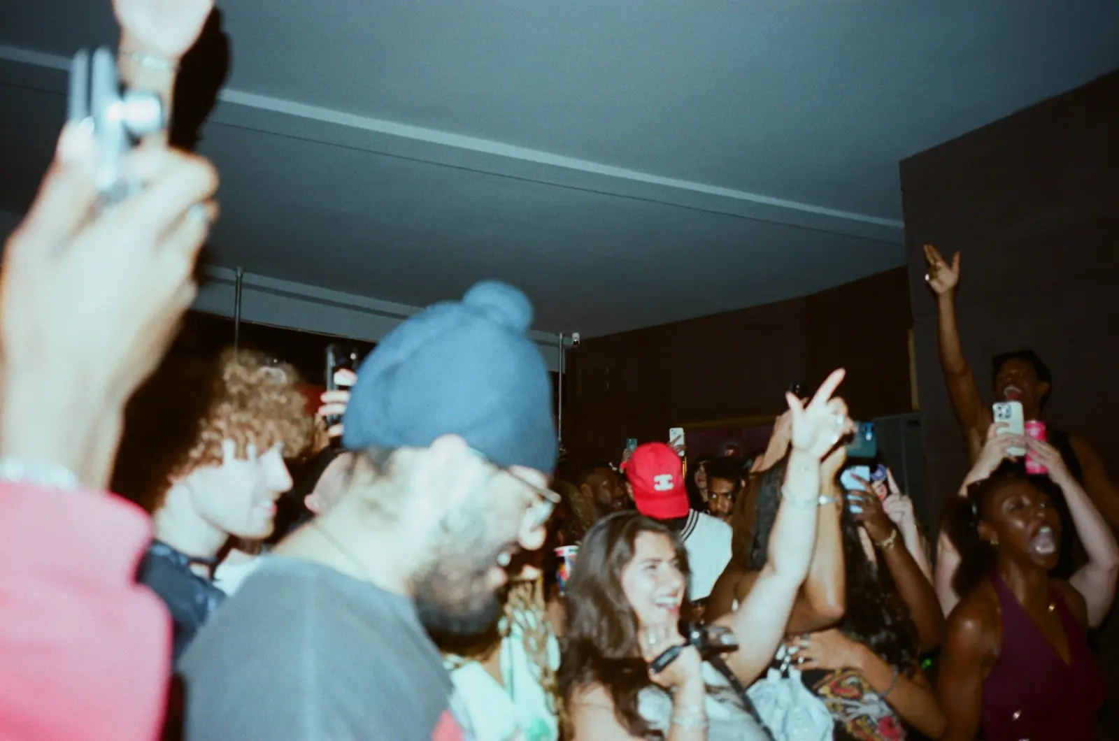 Hands and phones up inside the H.LLS listening party in London